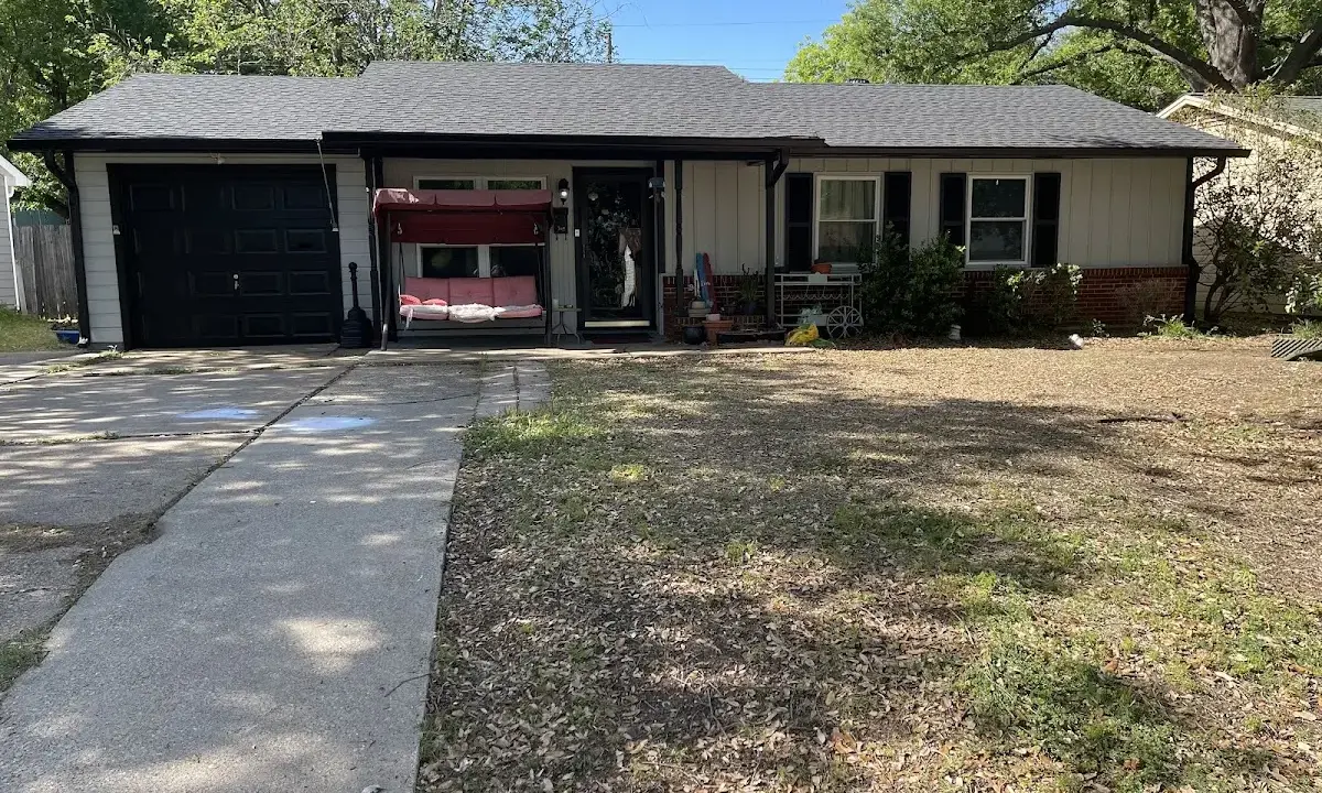 Asphalt Shingle Roof Repair crew at work on a residential roof in Lakeland North